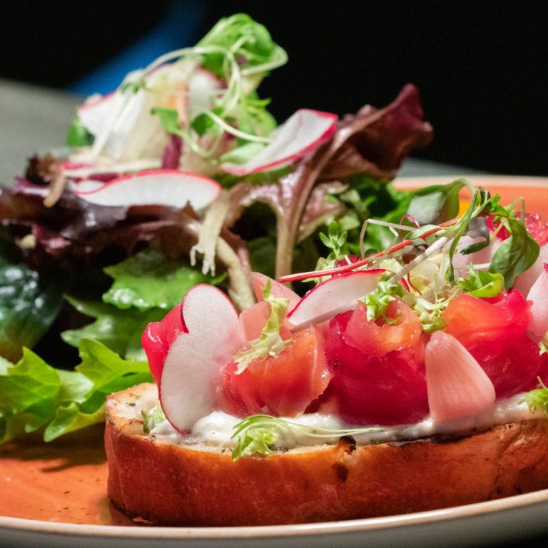 beet gravlax on toast with a side garden salad