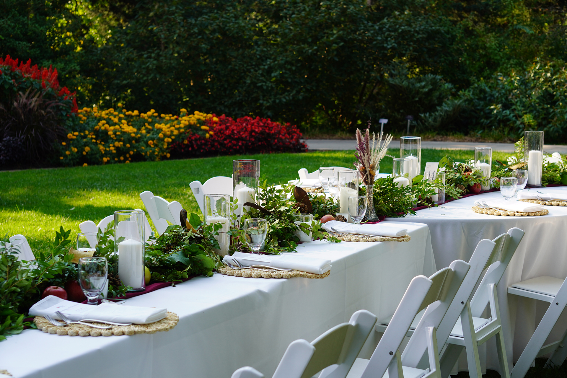 tablescape placed in the upper level of rock garden in fall
