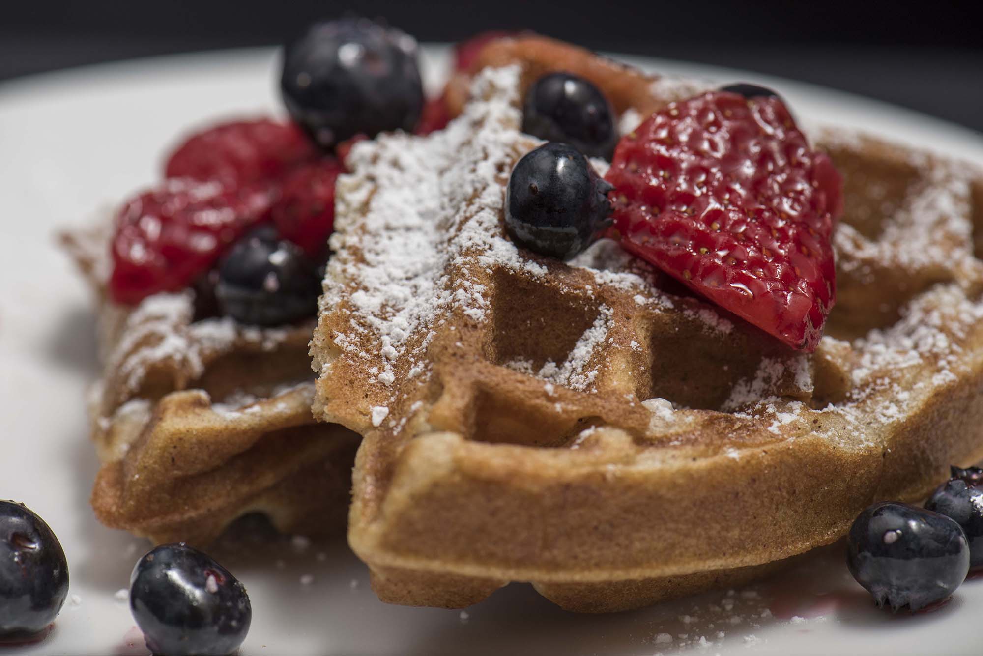 Waffles With Icing Sugar And Berries